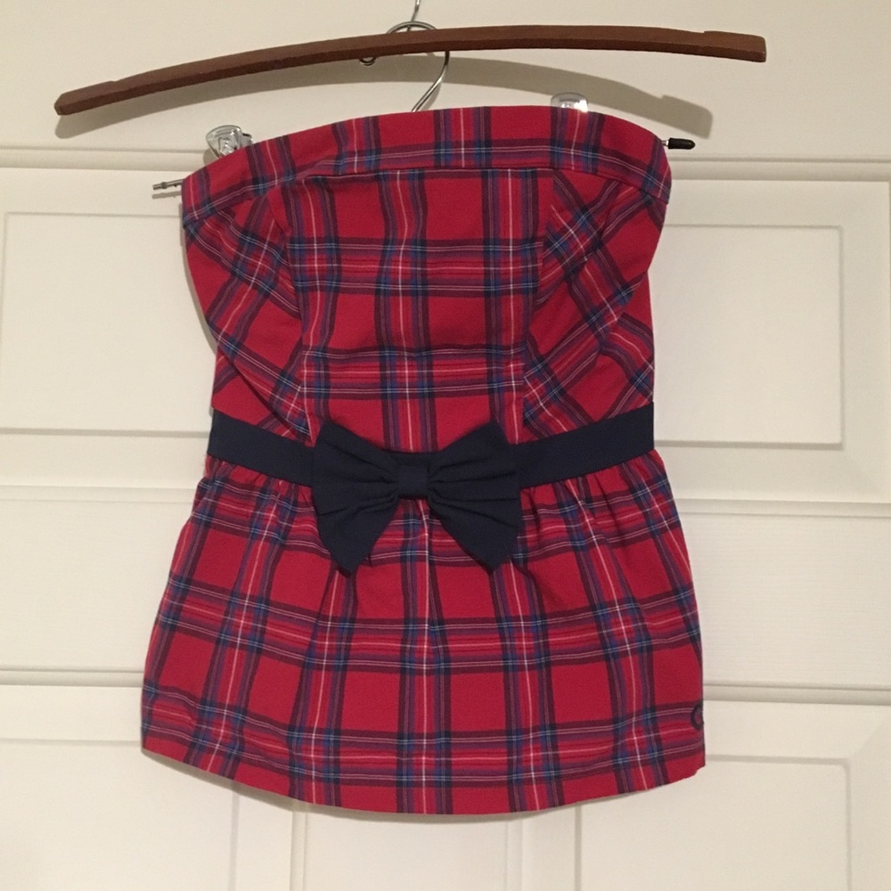 Cute plaid and pleated top!
